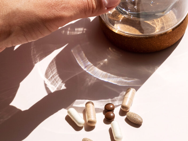 tablets and water glass